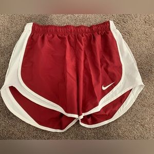 maroon and white nike running shorts size M